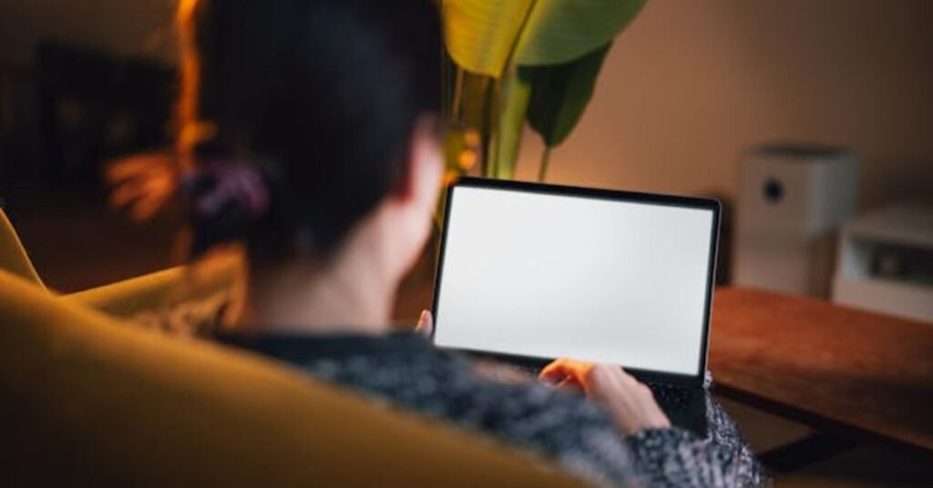 woman using laptop for some research